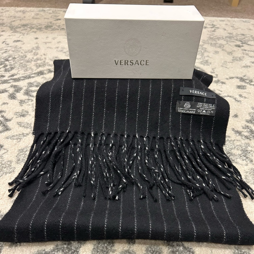 Versace NWOT Medusa Black and White wool Striped scarf  with fringed ends.